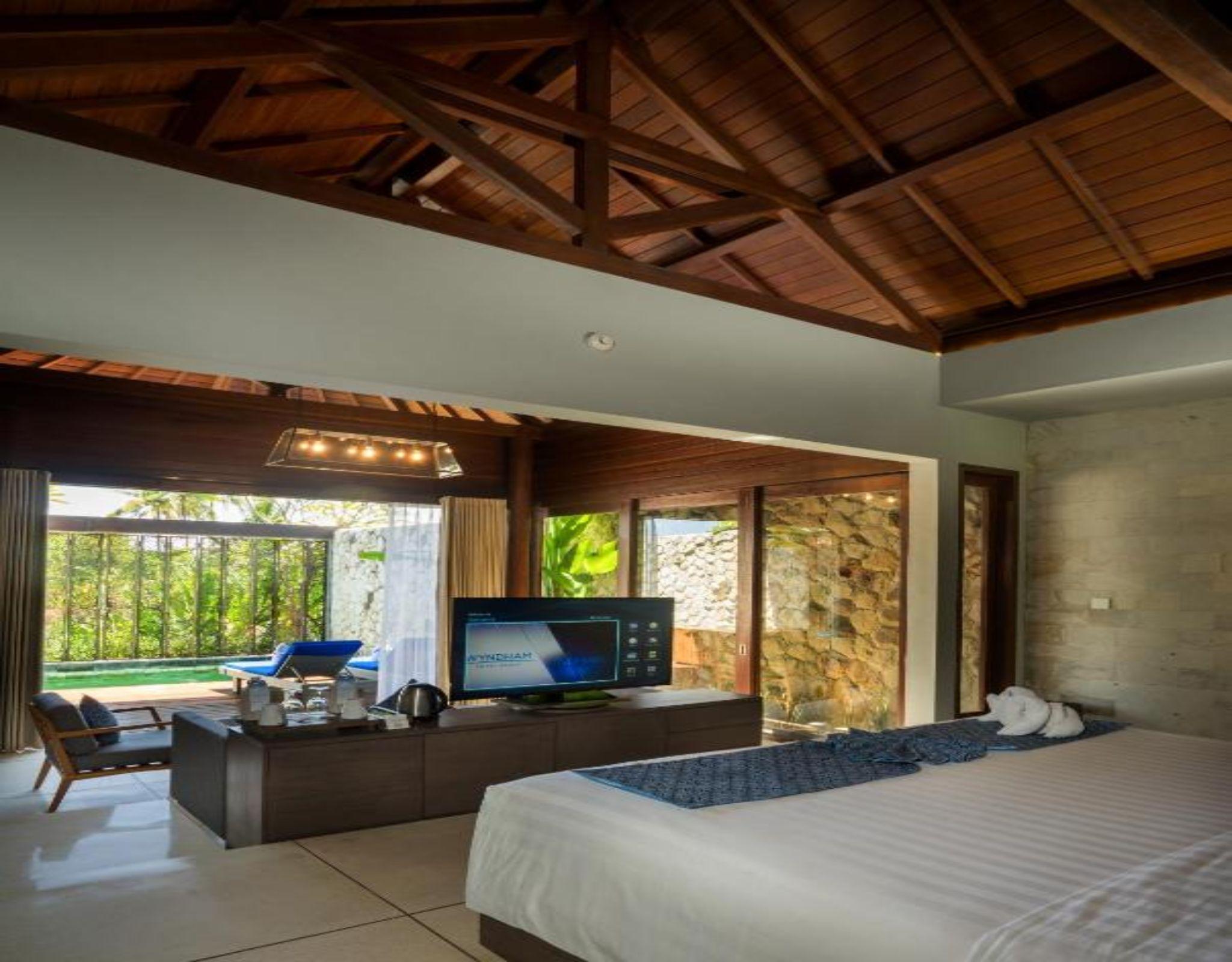 Wyndham Tamansari Jivva Resort Bali Siyut Экстерьер фото A bedroom at the resort