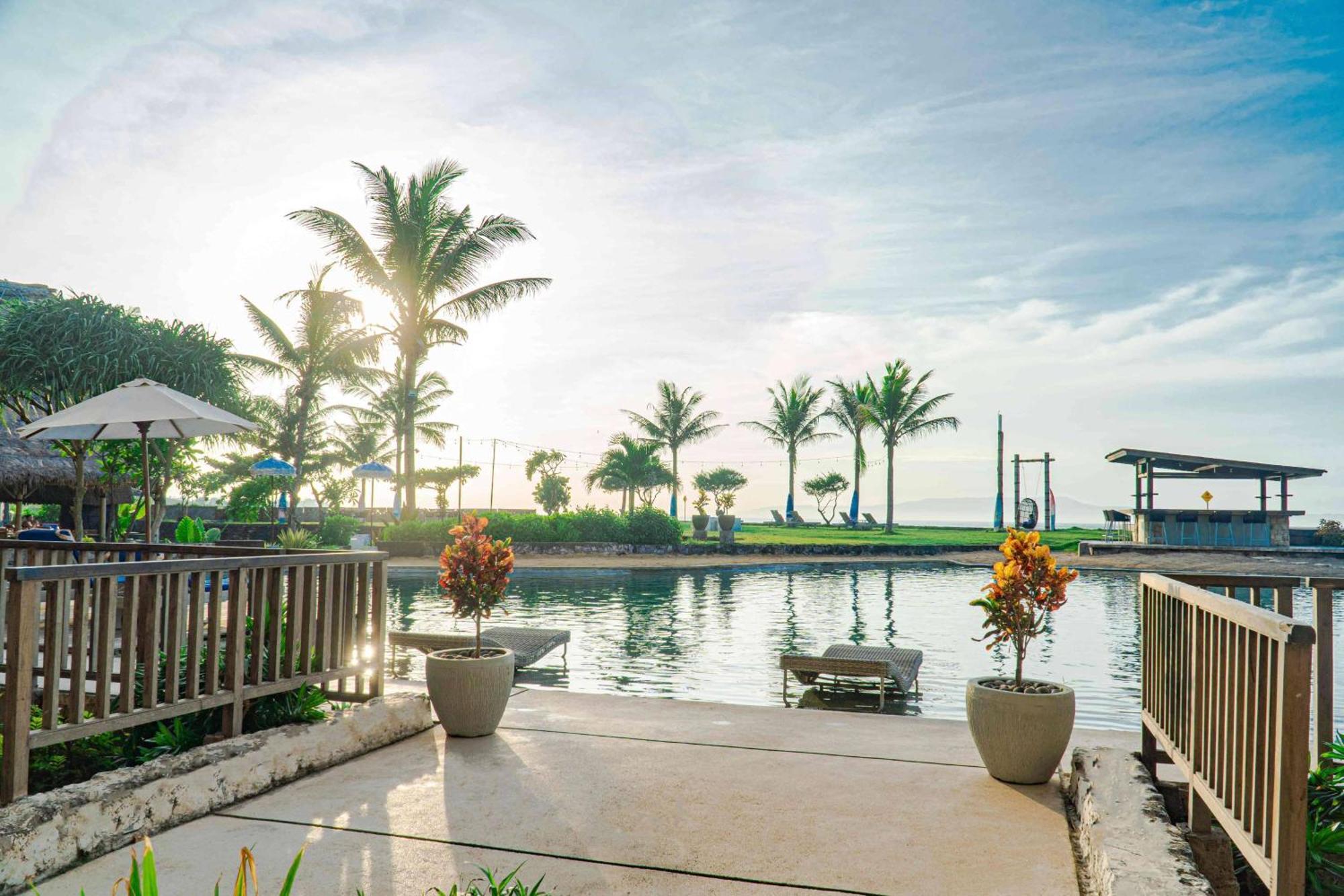 Wyndham Tamansari Jivva Resort Bali Siyut Экстерьер фото The pool at the hotel