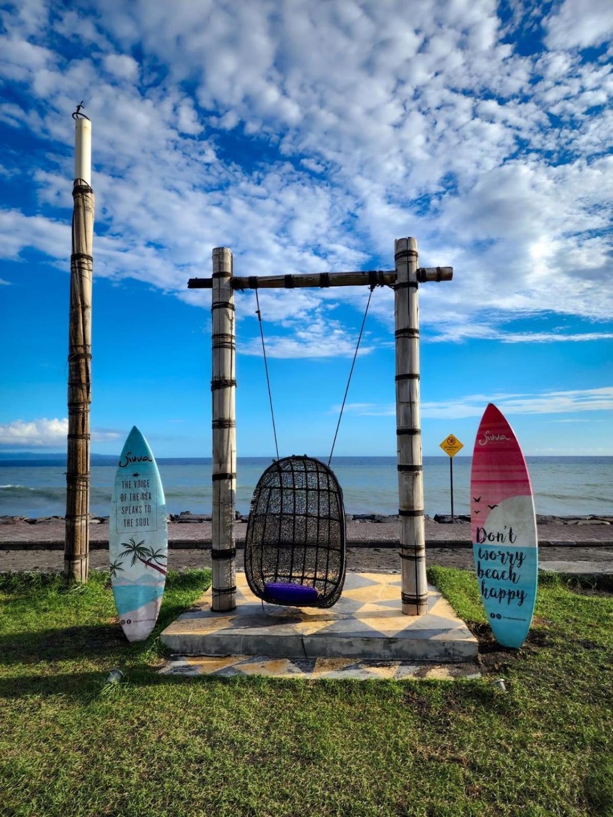 Wyndham Tamansari Jivva Resort Bali Siyut Экстерьер фото The swing at the beach