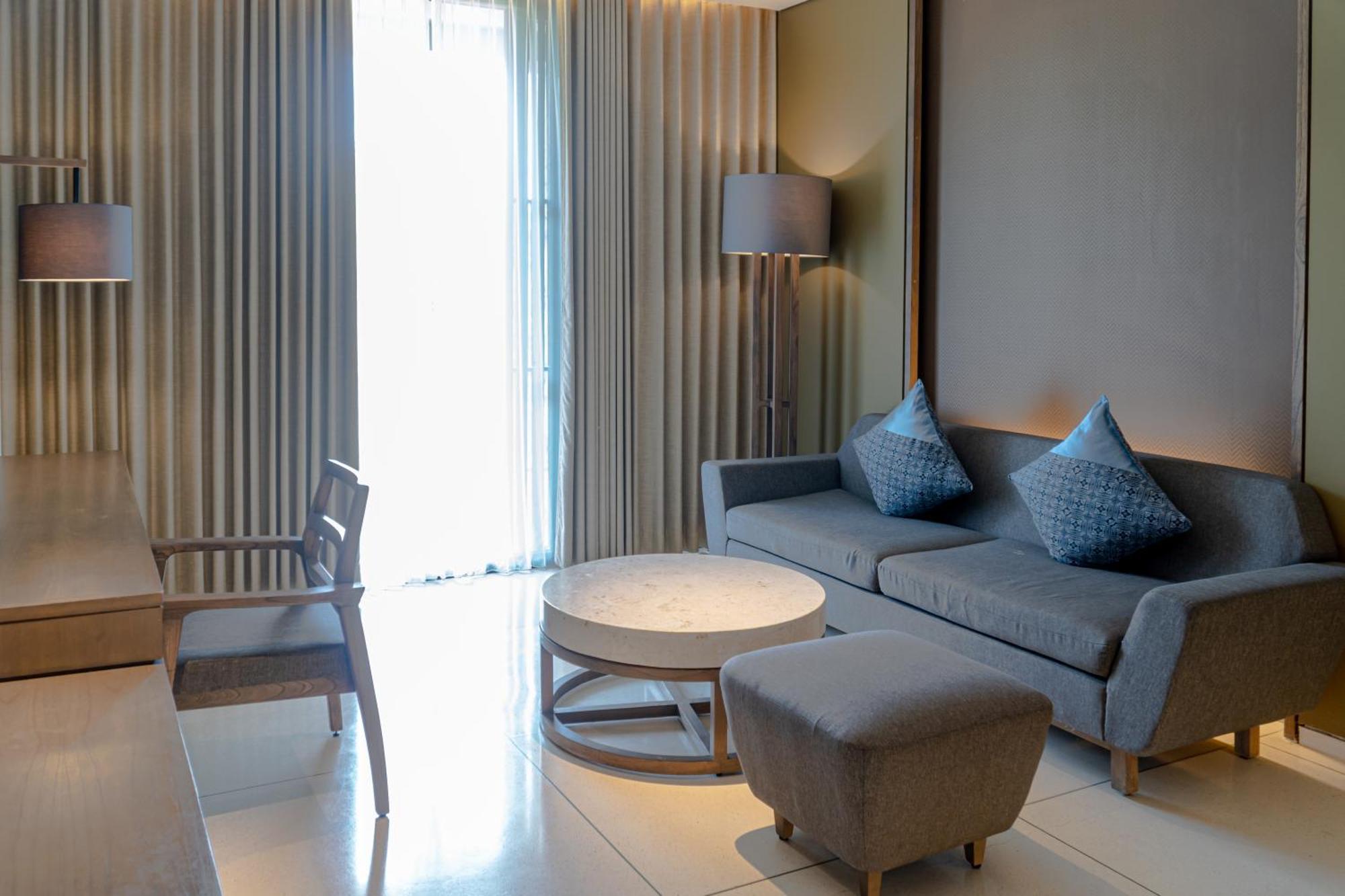 Wyndham Tamansari Jivva Resort Bali Siyut Экстерьер фото A living room at the hotel