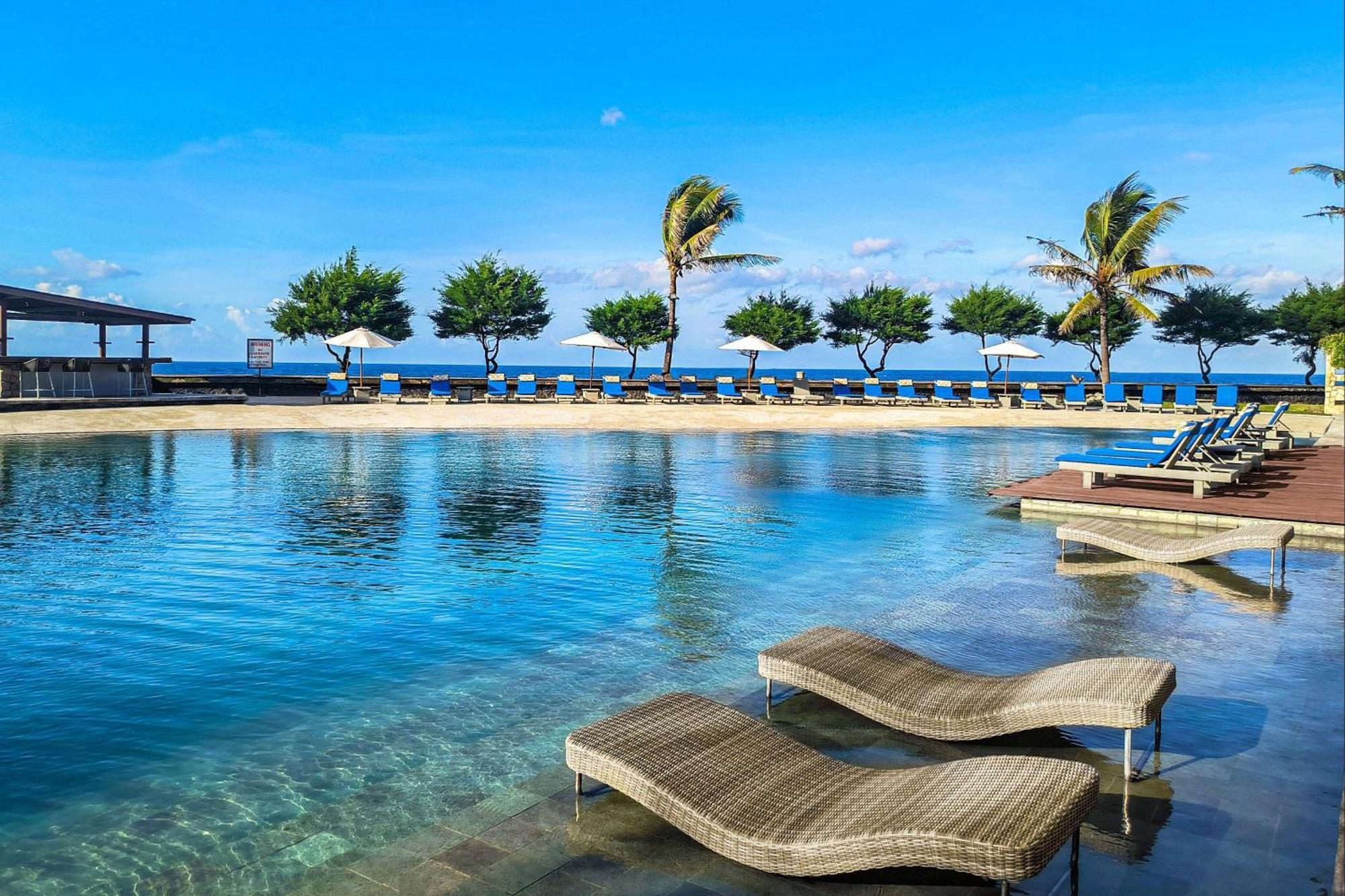 Wyndham Tamansari Jivva Resort Bali Siyut Экстерьер фото The beach at the hotel