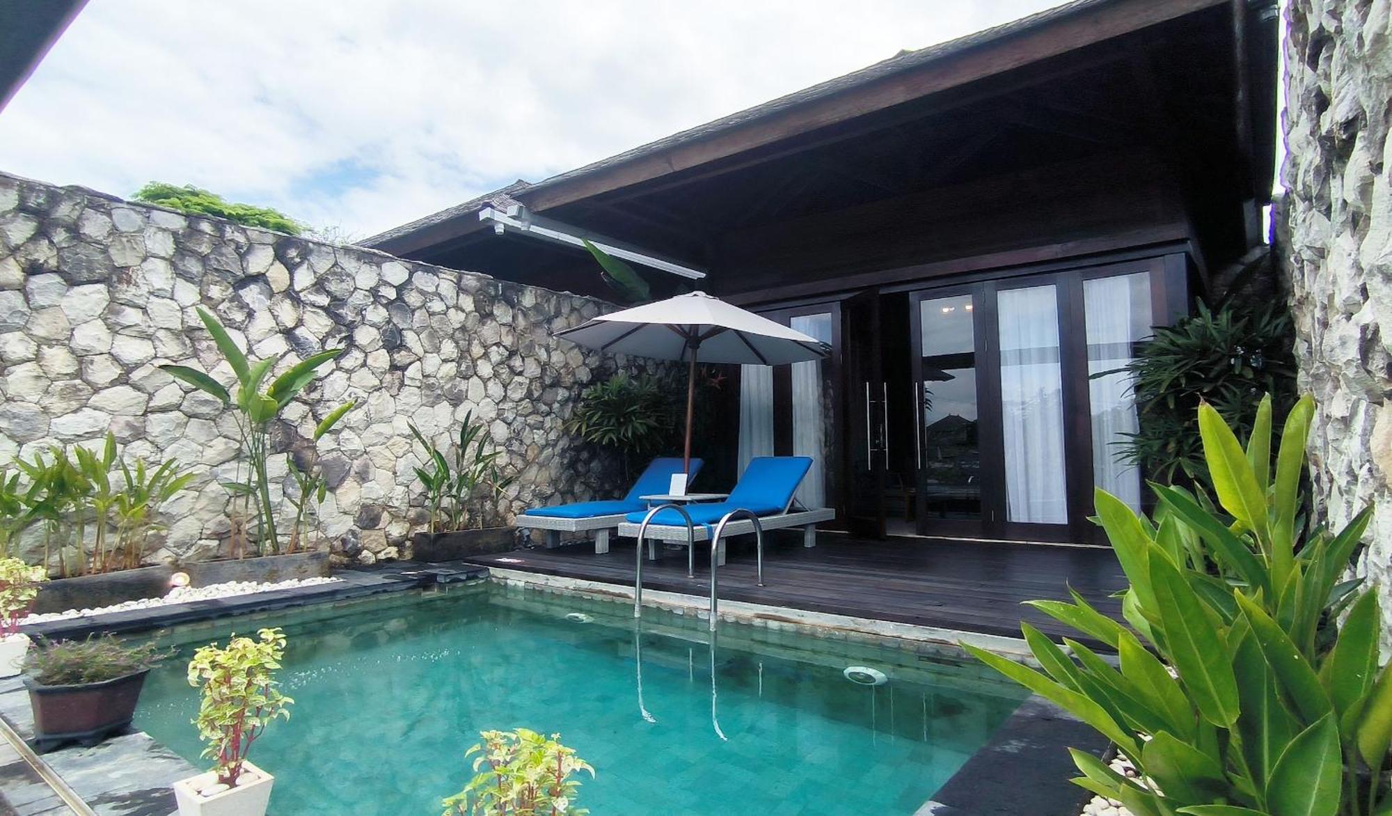 Wyndham Tamansari Jivva Resort Bali Siyut Экстерьер фото A pool villa at the resort
